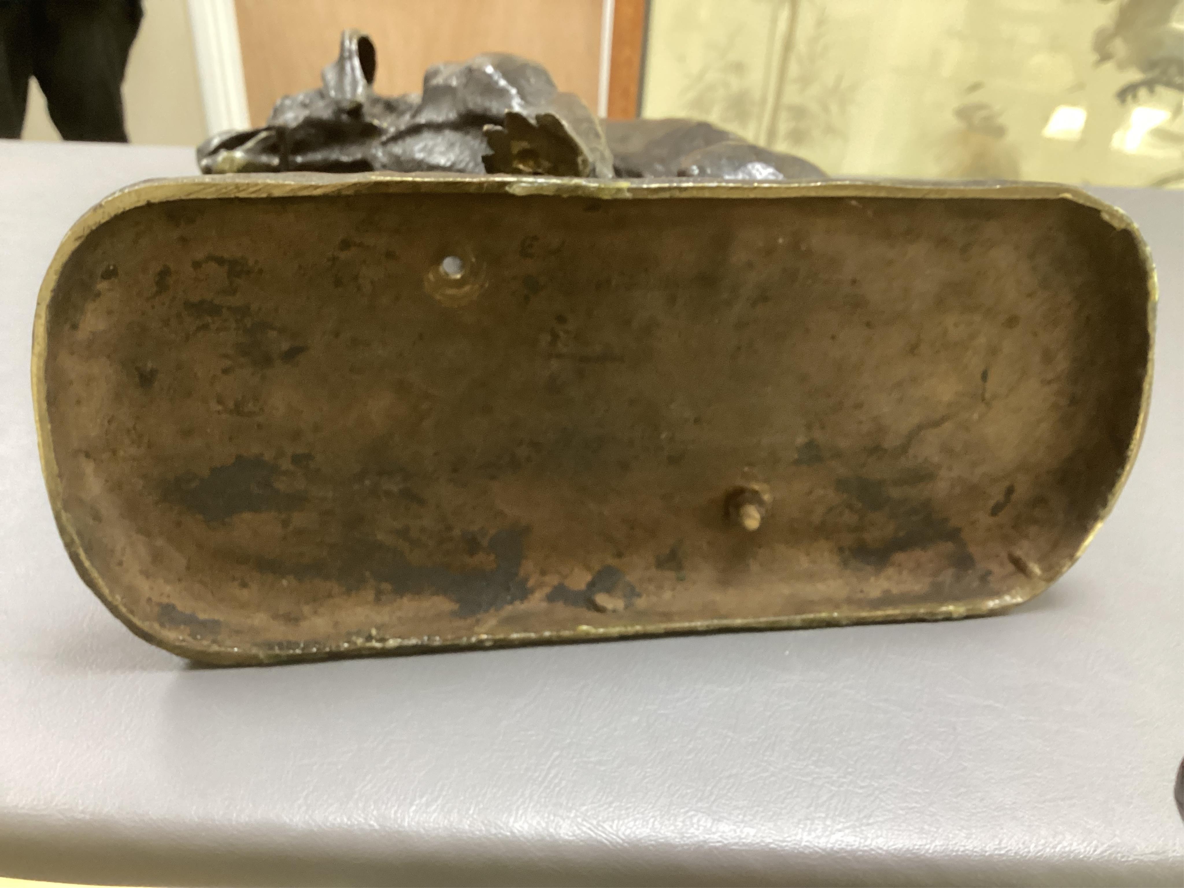 Animalier School, a bronze figure of a seated dog, early 20th century